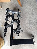 Full view of Thule hitch bike rack showing receiver mount and cradle arms