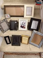 All ten frames displayed on carpeted steps
