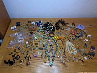 Entire assortment of jewelry spread on table