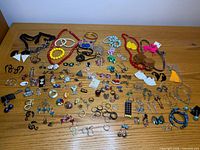 Full layout of all costume jewelry pieces on tabletop