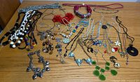 Full assortment of necklaces laid on table
