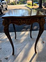 Full view of carved wood side table