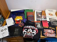 Wide view showing most memorabilia items spread on tabletop