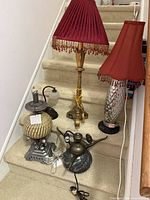 Group of five lamps on stairs
