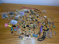 overview of all mixed jewelry pieces spread on table