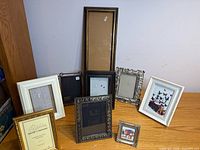 Group shot of assorted frames on tabletop showing sizes and styles