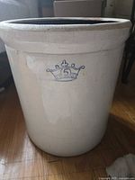 Full view of crock showing exterior glaze and blue crown 5 mark