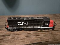 Side view of HO scale CN diesel locomotive 5075