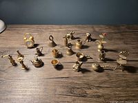 All brass miniatures grouped on tabletop
