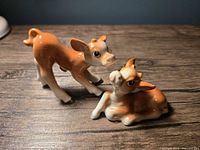 Both ceramic deer shakers front view