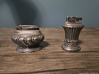 Front view of both Ronson lighters