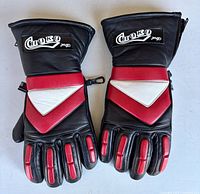 Front view of gloves showing Choko branding and red/white chevron panels