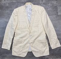 Front view of blazer laid flat