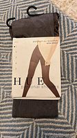 Front of Essential Shaper Satin Opaque Tights package