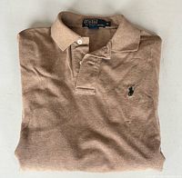 Folded shirt showing front and logo