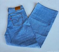 Full view of jeans front folded