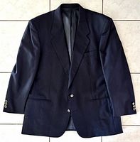 Front view of navy wool blazer showing two-button closure and overall condition