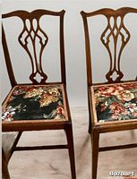 Front view of both chairs showing backs and seats