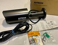 Camera, cable, mounting hardware, desiccant, box