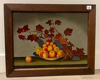 Front view of framed still-life painting