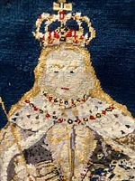 Close-up of crown and facial area showing stitch detail