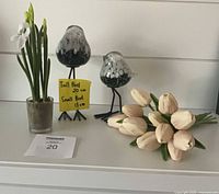 Group shot of both glass birds, tulip bouquet, potted flower
