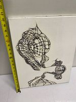 Front view of entire canvas showing abstract web-like ink design with tape measure for scale