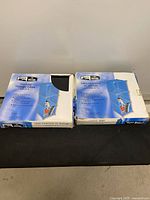 Two boxed sets of Simple Storage modular cubes