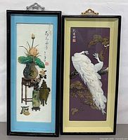 Front view of both framed shell artworks