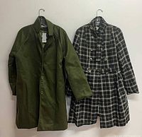 Both coats hanging to show full front view