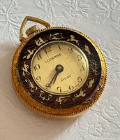 Front view showing dial, zodiac bezel and bail