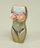 Front view of bikini torch lighter standing upright