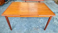 Top view of closed teak dining table