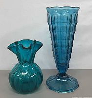 Front view of both vases standing upright