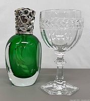 Wine glass and catalytic fragrance lamp side by side