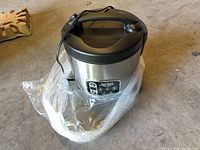 Closed rice cooker showing exterior and control panel