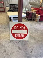 Front view of square red and white Do Not Enter traffic sign