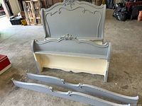 headboard, footboard and two side rails laid out