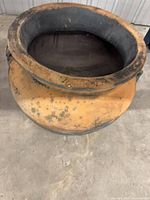 Top angled view showing overall shape and weathered exterior