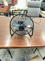 Front view of Mainstays desk fan showing overall appearance and blade