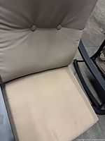 Close-up of cushions, button tuft detail, soiling