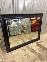 Front view showing full mirror and frame