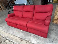 Front view of red three-seat sofa