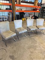 Front angled view showing all four chairs lined up