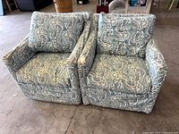 Front view of both swivel armchairs side by side