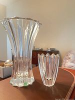 Front view of both vases showing heights and design