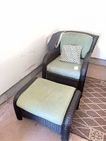 Chair with cushions and accent pillow