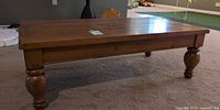 Full view of rectangular knotty pine coffee table