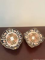 Both Royal Crown Derby oval Imari dishes side by side