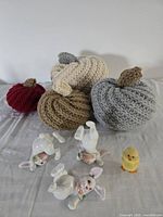 All four pumpkins, three rabbits and chick displayed together